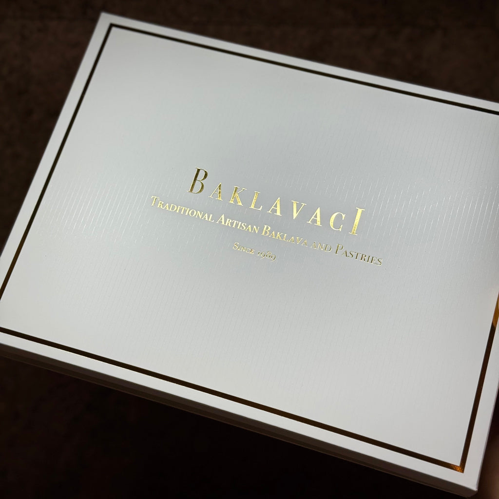 White box with gold text 'Baklavaci' on a dark background