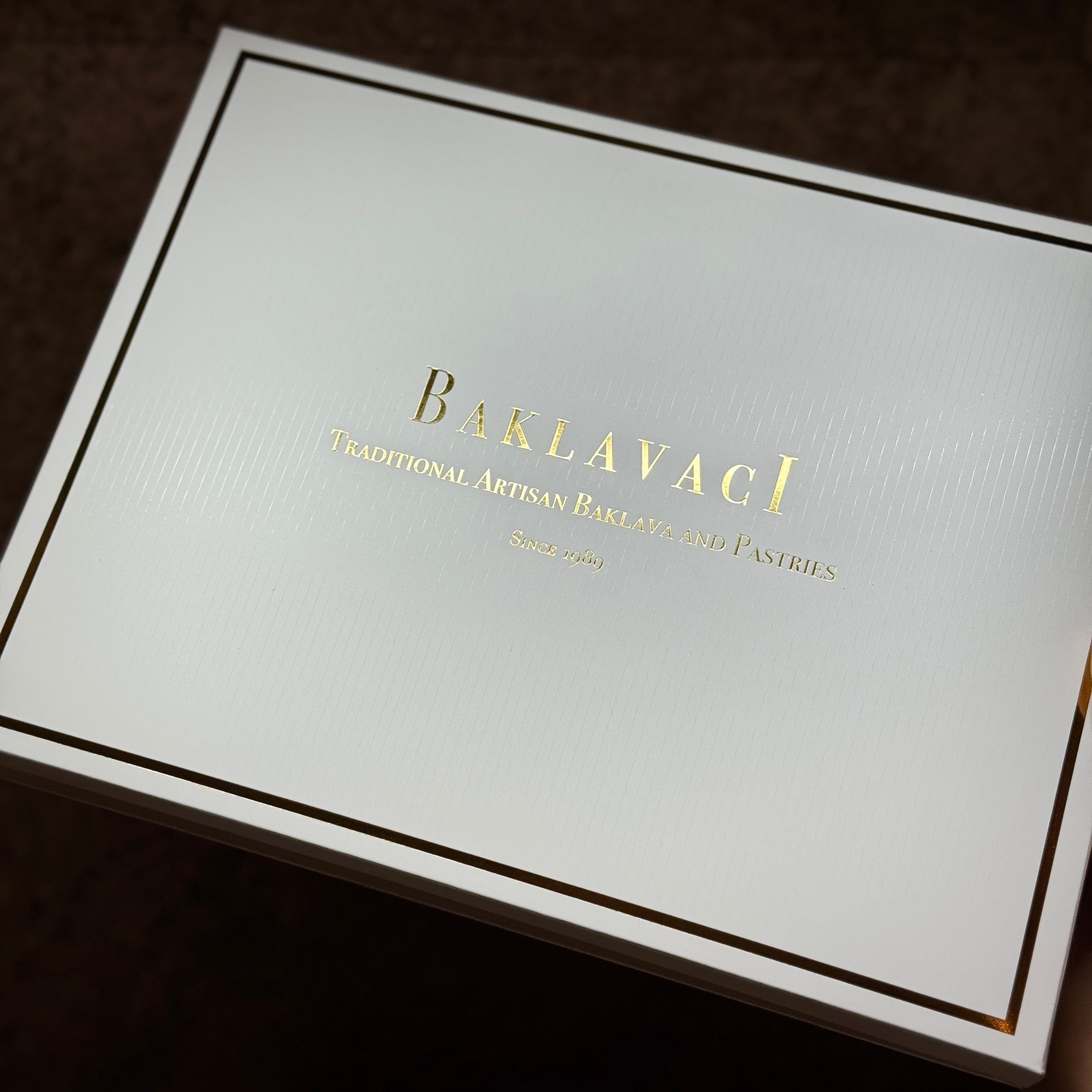 White box with gold text 'Baklavaci' on a dark background